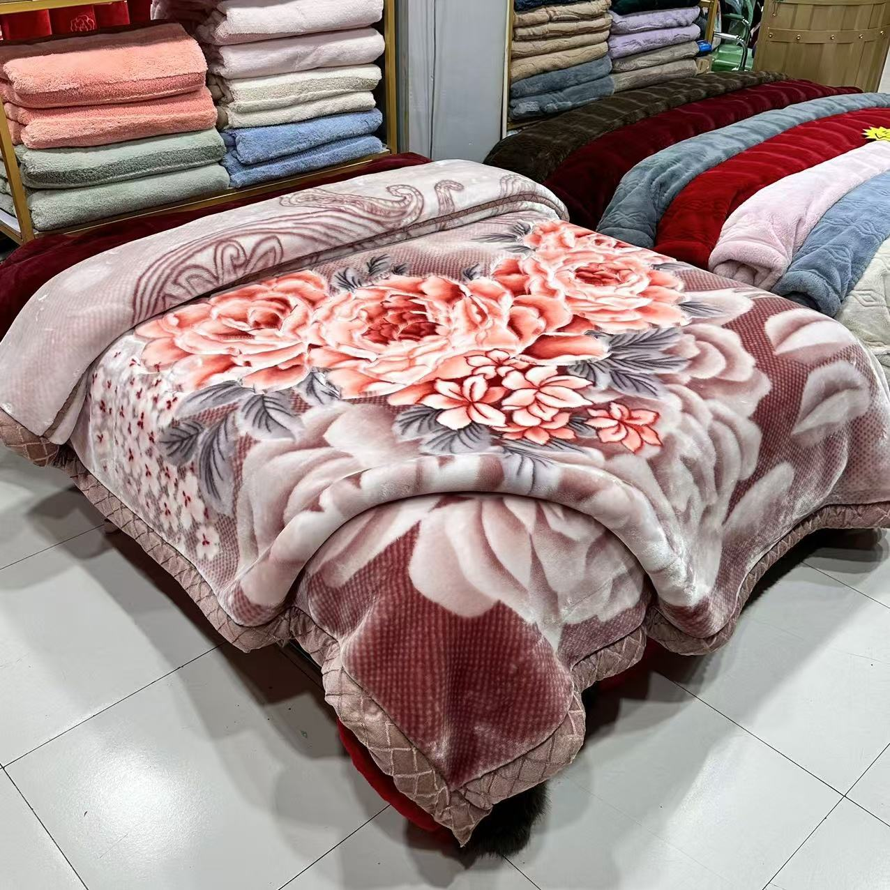 Hor Al Anz wholesale market shop with stacked blanket cartons